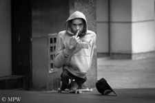 young beggar on Queen St Auckland